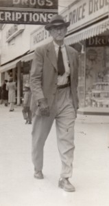 G.M.C. Massey walking on sidewalk
